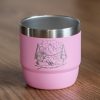 Pink mini insulated coffee cup with laser-engraved mountain and hiker design.