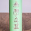 Close-up of laser-engraved winter sports icons on a mint green 750ml thermos.