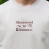Close-up front print on organic cotton t-shirt with Disconnect to Reconnect message