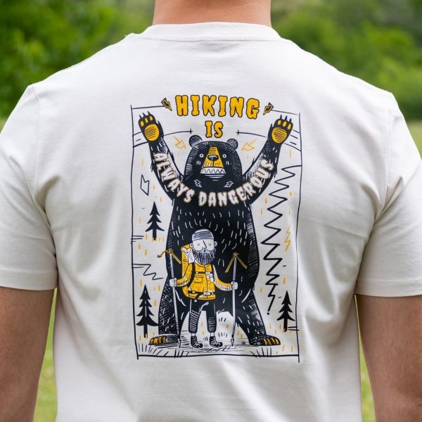 Close-up back print on white organic cotton hiking t-shirt with bear and hiker graphic