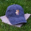 Navy blue vintage cotton baseball cap with embroidered hiking bear design, washed finish and adjustable Velcro strap