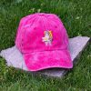 Pink vintage cotton baseball cap with embroidered hiking bear design, washed finish and adjustable Velcro strap