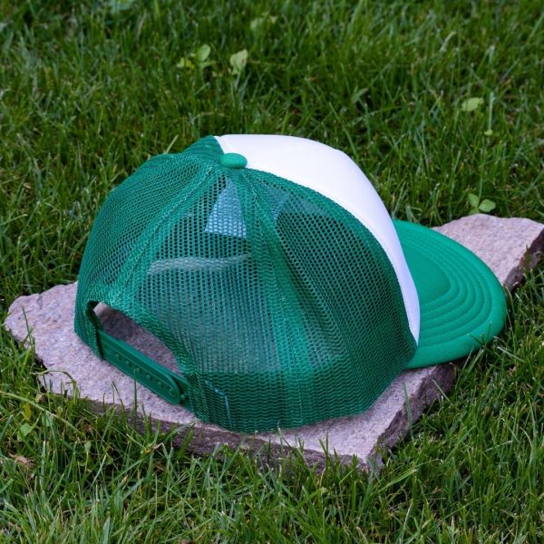 Rear view of white and green kids mesh cap made from durable material with adjustable plastic closure and breathable green mesh back.