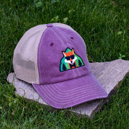Purple trucker cap made from organic and recycled cotton with embroidered fox, soft mesh back and adjustable closure