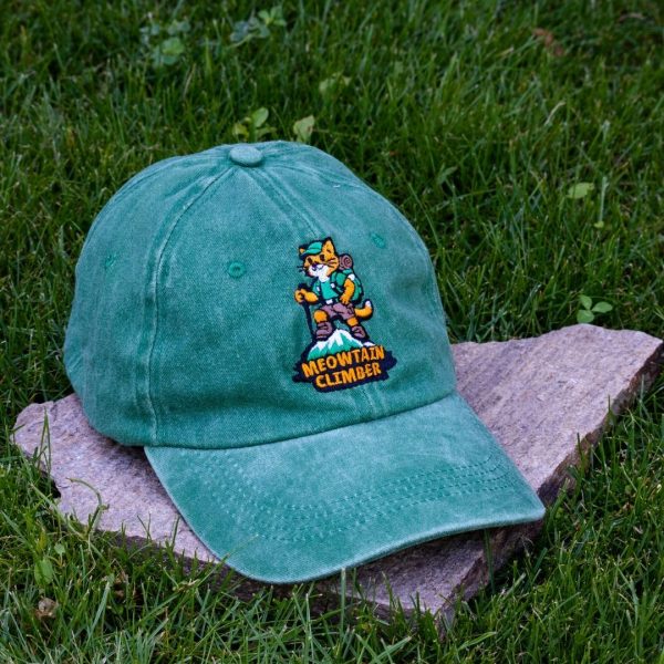Green vintage cotton baseball cap with embroidered Meowtain Climber cat, washed finish and adjustable Velcro strap